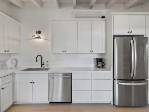 Full kitchen: Keurig, fridge, stove/oven, plates and utensils ,dishwasher