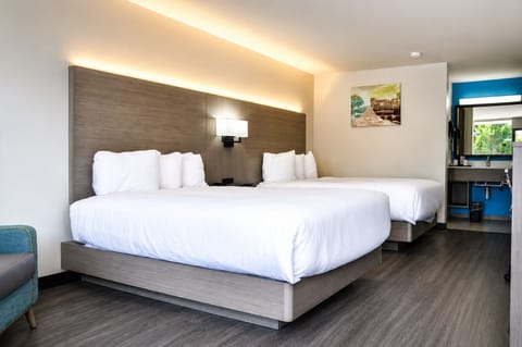 Standard Room, 2 Queen Beds, Non Smoking, Refrigerator & Microwave | Pillowtop beds, blackout drapes, iron/ironing board, cribs (surcharge)