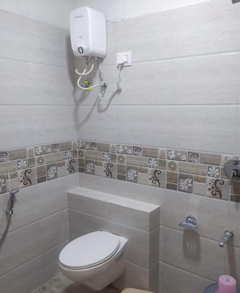 Double Bed AC Room | Bathroom | Combined shower/tub, spring water tub, rainfall showerhead, towels