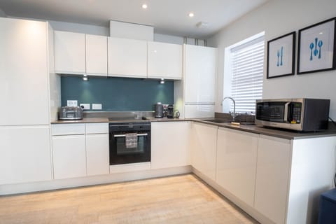 Design Apartment, Accessible, Ensuite (Orchard Point) | Shared kitchen