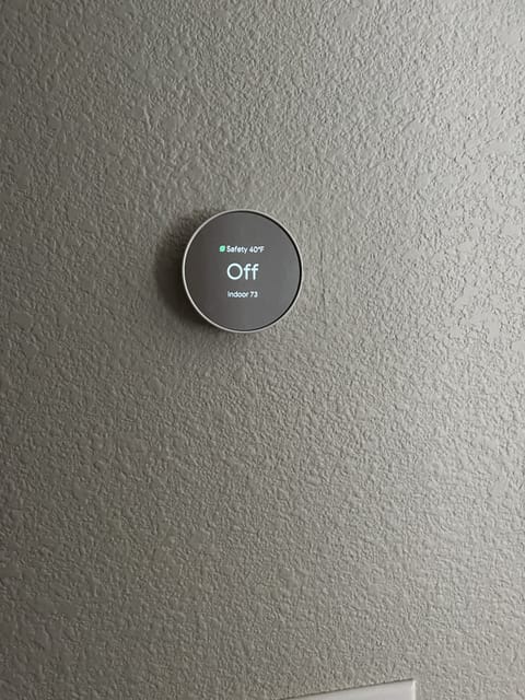 Nest-controlled thermostat. Heat & AC can be set prior to arrival. 