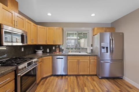 Enjoy Fully Stocked Kitchen w a Lake View