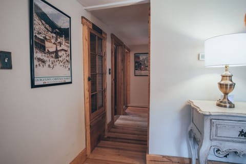 Hallway to two smaller bedrooms
