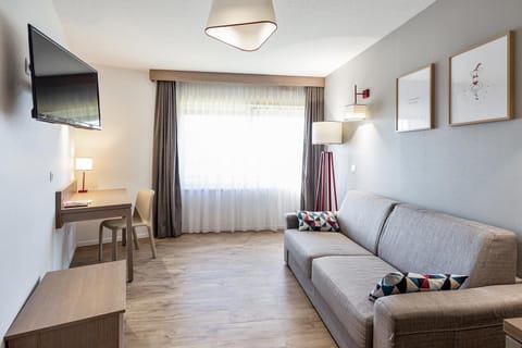 Apartment, 1 Bedroom | Desk, iron/ironing board, free WiFi, bed sheets