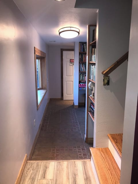 Hallway to Bedroom 2 and Upstairs