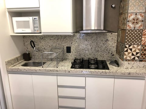 Comfort Apartment, Multiple Beds | Private kitchen | Microwave, toaster, cookware/dishes/utensils