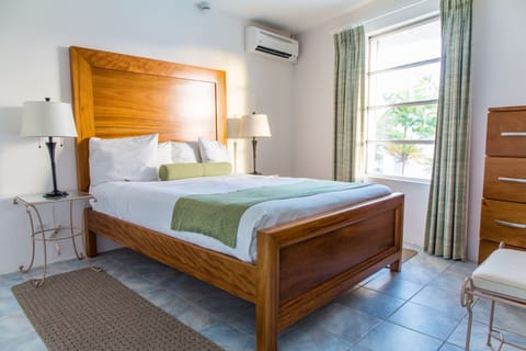 Family Suite, Pool View (Land Side) | In-room safe, desk, blackout drapes, iron/ironing board