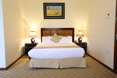 Standard Room, 1 Bedroom, City View | In-room safe, desk, iron/ironing board, cribs/infant beds