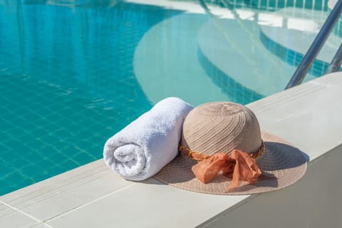 Outdoor pool, pool umbrellas, sun loungers