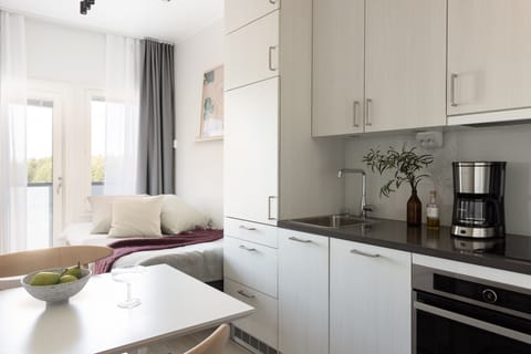 Mini studio with a view | Private kitchen | Full-size fridge, microwave, oven, stovetop