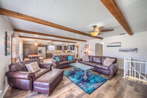 Living room on the main floor, with plenty of seating.