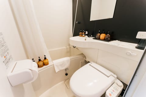 Combined shower/tub, free toiletries, hair dryer, bathrobes