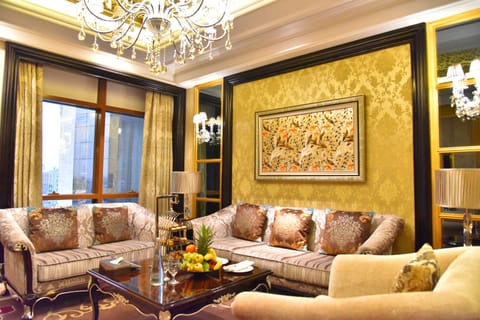 Executive Suite, 1 Queen Bed | Living area | 46-inch LED TV with satellite channels, TV