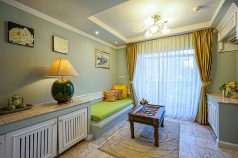 Suite, 1 Bedroom | Living area | TV