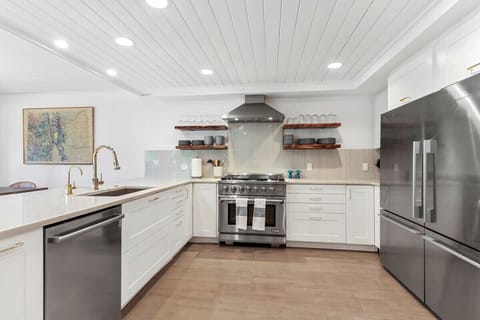 Fully-equipped kitchen with modern stainless steel appliances