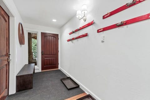 Front door entrance with bench seating