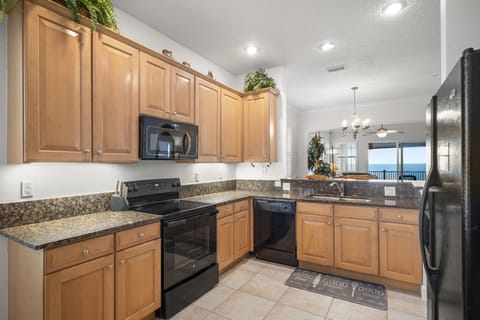 Condo (851 Cinnamon Beach - Pet Friendly) | Private kitchen | Fridge, microwave, oven, stovetop