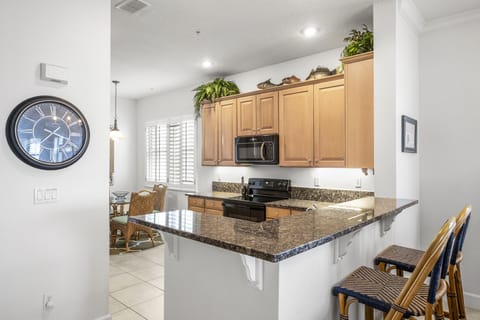 Condo (851 Cinnamon Beach - Pet Friendly) | Private kitchen | Fridge, microwave, oven, stovetop