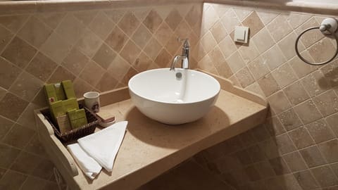 Standard Quadruple Room | Bathroom | Designer toiletries, hair dryer, slippers, bidet