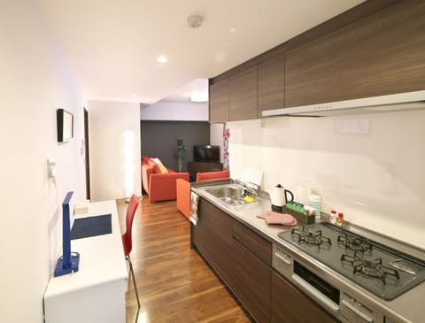 Luxury Apartment, Non Smoking | Private kitchenette | Fridge, microwave, stovetop, coffee/tea maker