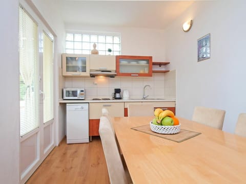 Cabinetry, Countertop, Furniture, Property, Window, Kitchen Appliance, Home Appliance, Wood, Orange, Kitchen