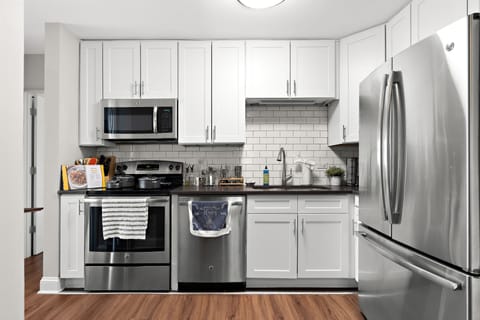 Fully stocked kitchen, w pots, pans, & cooking utensils to make gourmet meals.