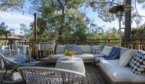 Zen deck offers majestic views and sounds of nature. Perfect gathering spot.