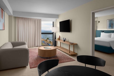 Suite, 1 Bedroom, Ocean View | Living area | 50-inch LED TV with cable channels