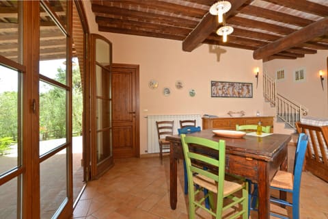 The dining room with kitchen corner in one of the units