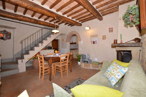 A living room with fireplace in one of the apartaments