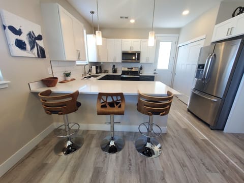 Entertain friends & family or whip up a quick meal in the well equipped kitchen.