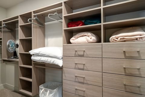 Walk in closet in the Primary King Suite