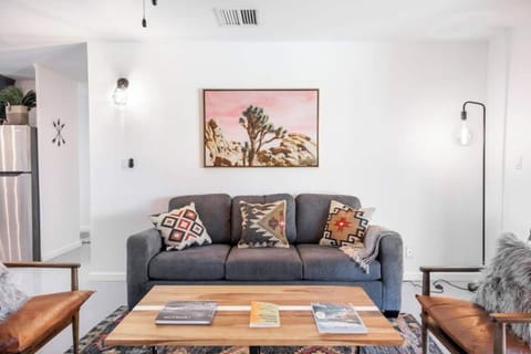 Living room sofa, chairs and coffee table.