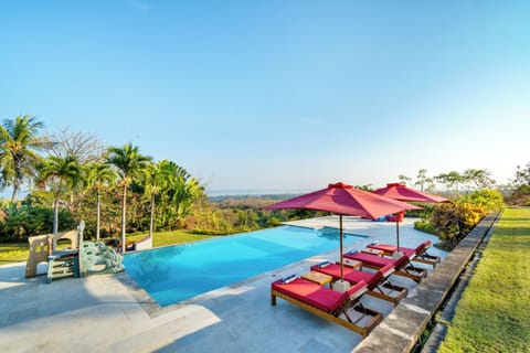 Outdoor pool, pool umbrellas, sun loungers