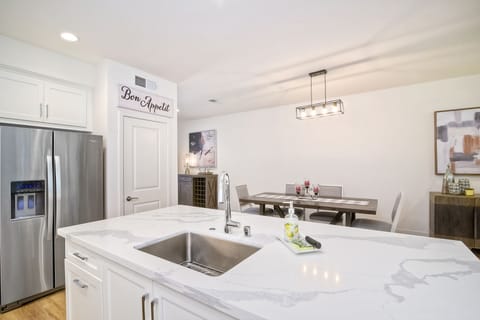 Kitchen looking into the dining and a peak at the bar