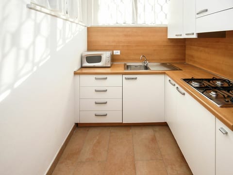 Cabinetry, Property, Countertop, Building, Kitchen Sink, Furniture, Sink, Wood, Kitchen Stove, Kitchen