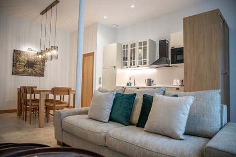 Traditional Suite | Living area | 40-inch Smart TV with digital channels, TV, smart speakers