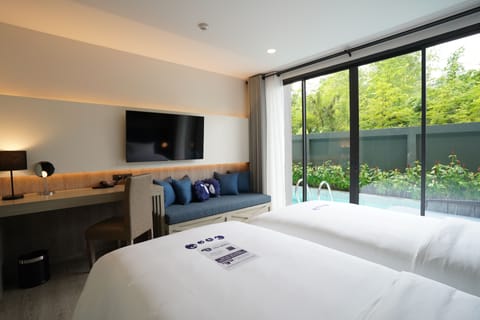 Deluxe Twin Room, Pool Access | In-room safe, desk, iron/ironing board, free WiFi