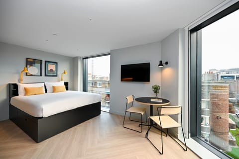 studio apartment | Premium bedding, in-room safe, blackout drapes, iron/ironing board