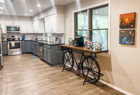 KITCHEN: Fully stocked with quality dishware and your coffee needs.