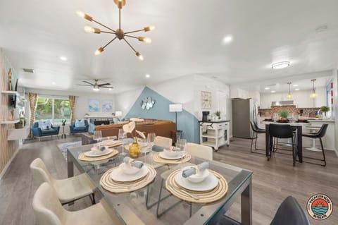 Seamless flow from kitchen to dining to living, perfect for gathering