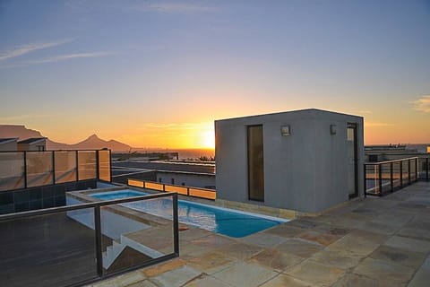 Enjoy sunset from the rooftop and cool down in the pool.