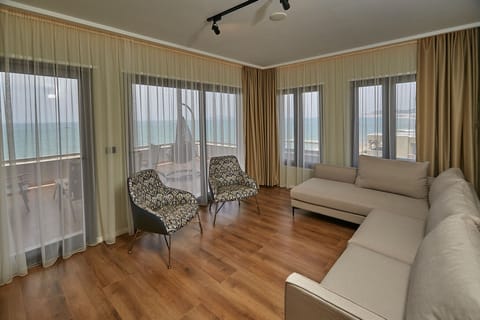 Executive Suite, Sea View | Living area | 43-inch LED TV with satellite channels, Netflix, streaming services