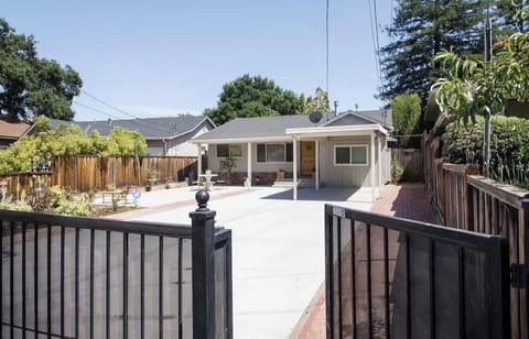 Gated home with 3 parking spaces inside the gate 
