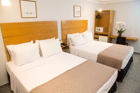 Deluxe Triple Room | Minibar, in-room safe, free WiFi, bed sheets