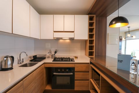 Comfort Apartment | Private kitchen | Fridge, microwave, stovetop, blender