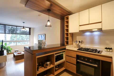 Apartment | Private kitchen | Fridge, microwave, stovetop, blender