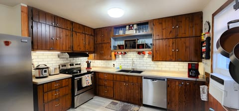 Fully Stocked Kitchen. Flour, spices, cooking oil, toaster, pots, pans, etc.
