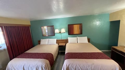 Standard Room, 2 Queen Beds | Iron/ironing board, free WiFi, bed sheets