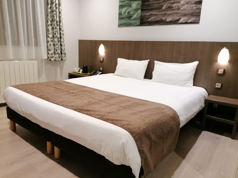 Minibar, desk, blackout drapes, soundproofing